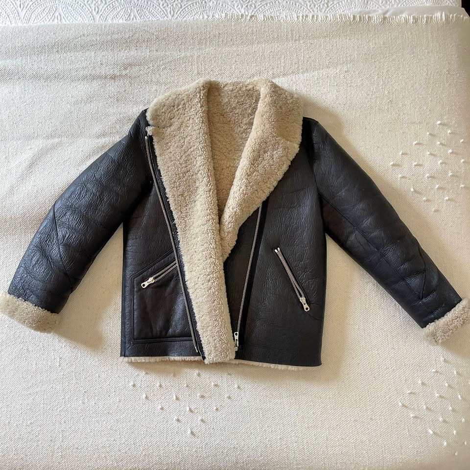 Luxurious Black Leather Jacket with Cream Sherpa Lining