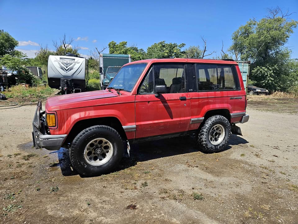 Rugged Red Isuzu Trooper for Your Adventures