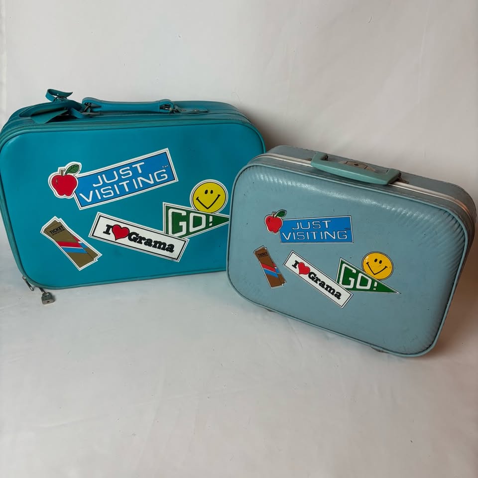 Teal Hard-Shell Suitcase with Fun Stickers