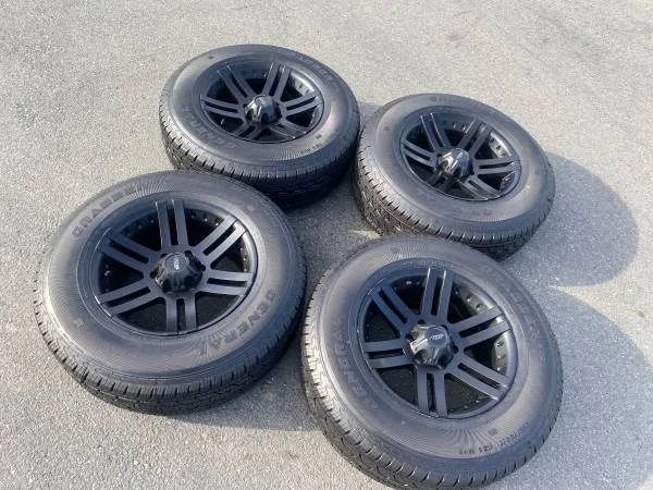 ZRA 17-inch Black Alloy Wheels with General Grabber HTS 255/70R17 Tires